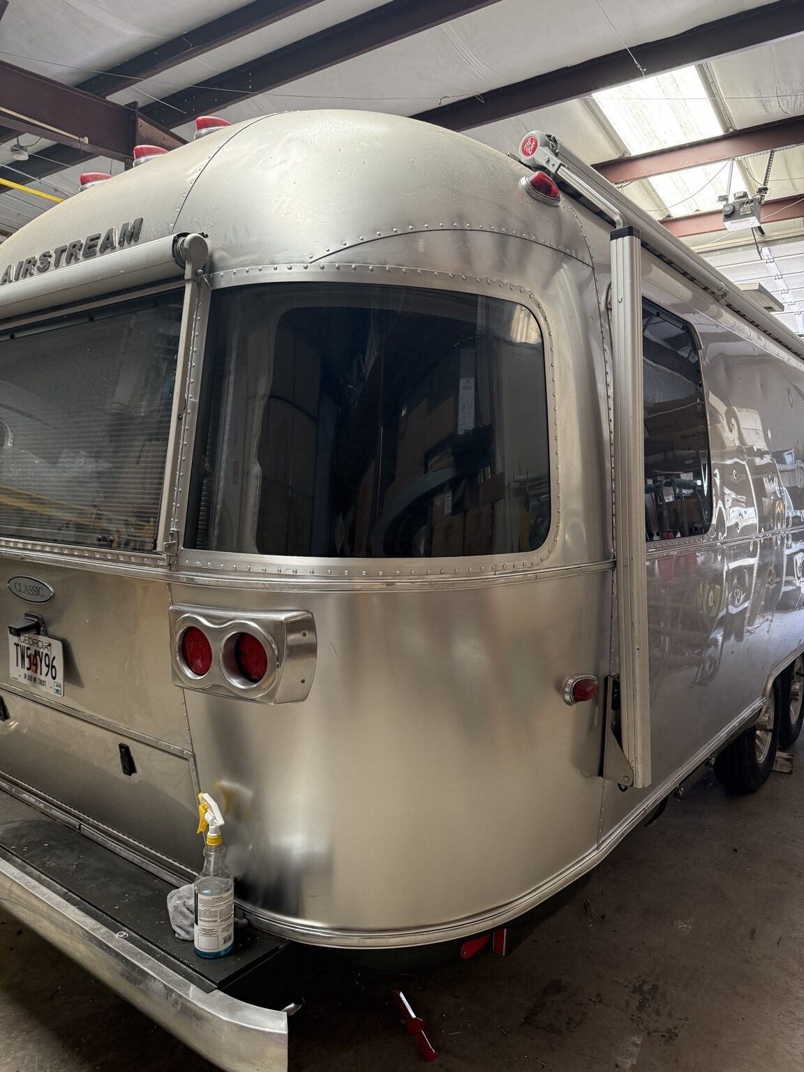 After repair: completed curved rear Airstream window replacement
